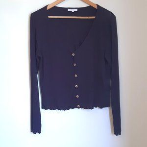 Black button down top with lettuce hem